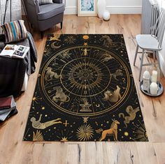 a living room area rug with zodiac symbols on it