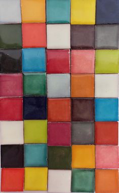 multicolored tiles are arranged in rows