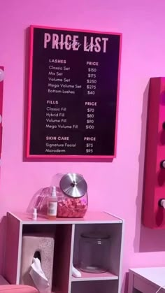 a pink room with purple walls and furniture in front of a price list on the wall