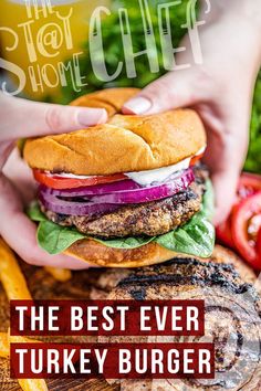 This image contains: A grilled turkey burger with tomato, lettuce, and onions being held by hands Burger Dinner Recipes, Light Chicken Recipes, Regular Burger, Burger Dinner, Juicy Turkey, Turkey Burger Recipes