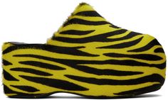 Lightweight padded calf hair slip-on loafers in black and yellow. · Graphic pattern printed throughout · Logo patch at padded footbed · Faux-leather lining · Covered platform midsole · Treaded rubber sole · Platform: H2.5 · Heel: H3.5 Supplier color: Zebra stripe Zebra Print Shoes, Yellow Streetwear, Trendy Shoes Sneakers, Yellow Fits, Streetwear Essentials, Fire Fits, Tomboy Style Outfits, Clothing Websites