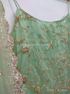 This is a made to order Salwar kameez. I craft it exclusively for my customers by using designer fine quality fabrics. I will only make it after you confirm your required size details. Handling time, don't worry, just tell me, I will process it accordingly and deliver on or before a delivery date you mention. Top kameez is made with broidered net fabric. Comes with net sequines dupatta. Dupatta also having gold lace stitched to all 4 sides. Bottom is readymade free size legging pant. Please note Green Floor-length Designer Wear Sets, Green Kurta With Mirror Work And Traditional Drape, Green Silk Sharara With Straight Kurta, Green Raw Silk Anarkali Set With Gota Work, Fitted Green Choli Straight Kurta, Green Raw Silk Sharara With Dori Work, Green Churidar With Mirror Work In Traditional Drape, Green Floor-length Kurta With Gota Work, Green Churidar With Mirror Work