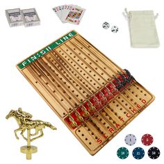 a wooden board game set with dices, cards and other items to play it