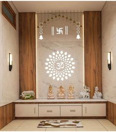 a white and brown room with buddha statues on the wall