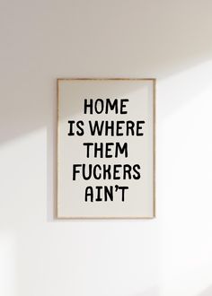 a black and white poster with the words home is where them fuchs are not