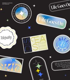 there are many different stickers on this black background, including one with the words life goes on