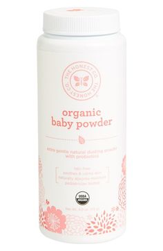 a bottle of organic baby powder on a white background