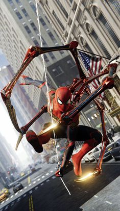 spider - man in the city with his arms outstretched and hands extended, swinging on a string