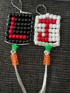 two pieces of bead art made to look like carrots and an american flag