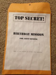 a piece of paper with the words top secret birthday mission for agent benzing on it