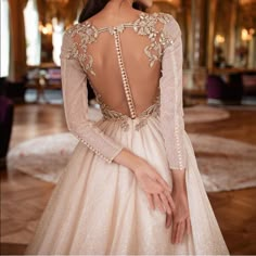 the back of a woman's wedding dress