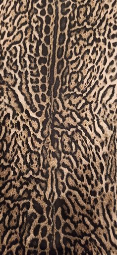 an animal print area rug is shown in black and white