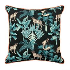 a black pillow with blue and orange jungle animals on it