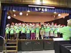 a group of people standing on top of a stage