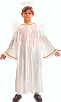 a young boy dressed in a white angel costume