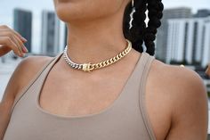 "This is a one-of-a-kind curb choker that is so unique you have to buy it just to have it! One side of this choker is white gold, and the other is 18k gold filled with a beautiful gold box clasp to secure the piece nicely! Measurements/Specs: - 14.5\" Thick Link Choker - 11mm Thick - Color is split right down the middle 🌼Check out the matching Bracelet Here: https://bit.ly/Cubanbracelets This piece looks beautiful alone or mixed and matched! 🌺 Care Instructions: -We always recommend anything t Luxury Silver Cuban Link Box Chain Necklace, Cheap Cuban Link Metal Chain Necklace, Luxury Tarnish-resistant Cuban Link Necklace, Gold Cuban Link Necklace With Curb Chain For Streetwear, Gold Chain Link Choker With Curb Chain, Cuban Link Curb Chain Necklaces For Streetwear, Cuban Link Curb Chain Necklace For Streetwear, Streetwear Cuban Link Curb Chain Necklaces, Gold Curb Chain Choker