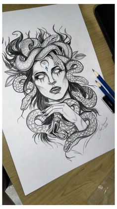 a drawing of a woman with a snake on her head