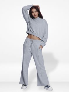 WomenGrey Hoodies Wide Leg Pants Sweatsuit Lounge Sets Effortless elegance meets versatile chic with our Women's Black Hoodies and Wide-Leg Pants Sweatsuit Lounge Sets. Quality comfort and stylish statements redefine relaxation in fashion-forward loungewear. Shop now for a perfect blend of comfort and style! Features:              Style: Casual and sporty with a relaxed, modern design          Fit: Regular fit with a hoodie and jogger pants for comfort and  flexibility         Fabric: French Ter Gray Hoodies, Black Hoodie Women, Spandex Top, Comfort Design, Pantalon Large, Street Style Looks, Lounge Sets, Jogger Pants, Black Hoodie