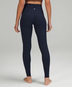 When feeling nothing is everything. Powered by Nulu fabric, this ribbed version of our lululemon Align pants feels weightless and buttery soft. Designed for Yoga. Full length intended to sit at ankle. Hidden waistband pocket fits a card or key, and won't get in your way. This collection's great for low-impact workouts like yoga or whenever you want to feel really, really comfortable. Buttery-Soft, Ribbed NuluTM Fabric. Lululemon Leggings Navy, Navy Blue Lululemon Leggings, Lululemon Clothes, Navy Lululemon, Post Yoga, Navy Blue Leggings, Lulu Leggings, Lululemon Align Pant, Navy Leggings