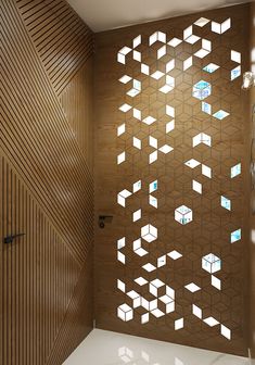 a bathroom with wooden walls and tiled floors