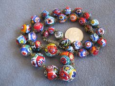 18" Vintage Venetian Murano Millefiori Bead Necklace Bright Colors Graduated | eBay $99.99 Collectible Multicolor Beaded Jewelry, Multicolor Beaded Collectible Jewelry, Antique Multicolor Beaded Necklaces With Round Beads, Multicolor Round Necklace For Collectors, Antique Multicolor Round Bead Necklaces, Antique Multicolor Jewelry With Polished Beads, Antique Multicolor Beads For Gift, Antique Multicolor Round Beads Necklace, Antique Multicolor Beads For Gifts