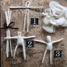 the instructions for how to make an ornament out of yarn are displayed on a wall