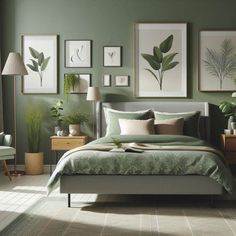 a bedroom with green walls and pictures on the wall above the bed in front of it