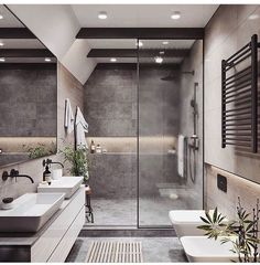 a modern bathroom with two sinks and a walk in shower