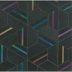 a black tile with multicolored lines on it