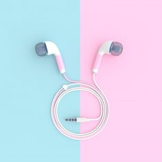 two earphones on top of each other in front of a pink and blue background