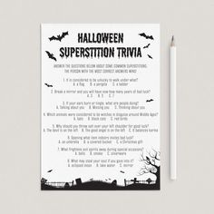 a halloween superstition trivia is shown next to a pencil and eraser