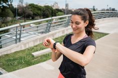 Fitness woman checking time on smart watch. by megostudio. Portrait of a fitness woman checking time on her smart watch. Sport and healthy lifestyle concept. #Sponsored #time, #smart, #watch, #Fitness Picture Of A Woman, Woman Exercising, Sports Training, Business Advertising Design, Sports Photos, Iconic Photos, Lady V, Active Lifestyle, Running Women