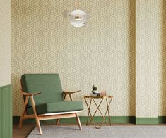 a chair and table in front of a wallpapered room with green trim on the walls