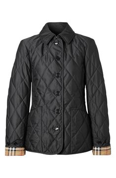 This slim-fit quilted coat features innovative 37.5® thermoregulation technology that both evaporates moisture and traps body heat to keep you comfortable. Roll up the cuffs to reveal the heritage check lining. 26" length (size Medium) Front button closure Spread collar with hook-and-eye throat latch Button-tab cuffs Front patch pockets Lined 100% polyester Dry clean Imported Women's Designer Clothing Burberry Coat Quilted, Burberry Short Jacket, Burberry Jacket, Tailored Shorts, Heritage Fashion, Quilted Coat, Burberry Women, Field Jacket, Rain Wear