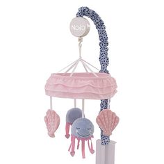 a pink and blue musical mobile with an octopus on it