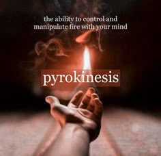 a person holding a lit candle with the words pyrokinesi on it