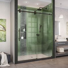 a bathroom with a walk in shower next to a sink