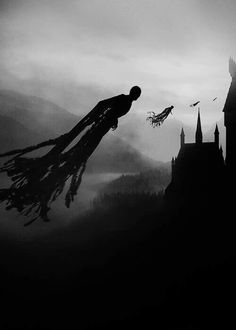 a black and white photo of a person flying in the air over a castle on a foggy day