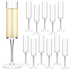 a set of six champagne flutes with wine glasses in front of each one on a white background