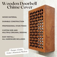 the wooden cover is made from wood and has holes in it to create an interesting pattern