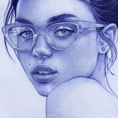 a pencil drawing of a woman wearing glasses