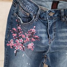 Absolutely Brand New Without Tags!! Washed & Put In Closet Only!! Size 6 Features: Pink Embroidered Flowers & Paint Splatters! *Final Price! No Further Discounts!* All Items From Smoke-Free & Pet-Free Home Will Not Ship Internationally. All Sales Are Final. No Returns. Please Ask Any Questions You Have Before Purchasing. Thank You! Embroidery Denim Jeans, Painted Jean Pants, Painted Jeans Flowers, Embroidery Jeans Diy Easy, Painted Blue Jeans, Painting On Jeans, Painted Pants, Embroidery Jeans Diy, Clothes Embroidery