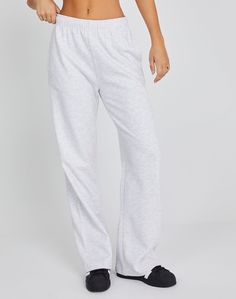 These sweatpants feature a mid rise waist, wide leg fit and an elastic waist. Comfortable Elevated Casual Bottoms, Relaxed Fit High-waisted Sweatpants With Elastic Waistband, Elevated Casual Full-length Sweatpants With Elastic Waistband, Full Length Sweatpants For Elevated Casual Look, Straight Leg Relaxed Fit Sweatpants For Elevated Casual, Wide Leg Sweatpants With Elastic Waistband For Casual Wear, Elevated Casual High-waisted Sweatpants With Elastic Waistband, Straight Leg Sweatpants For Elevated Casual Wear, Elevated Casual Sweatpants With Elastic Waistband