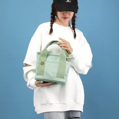 〖Simple Japanese style〗 The plain canvas material is matched with a retro version, with a strong Japanese style, which can be used as a daily bag with various clothes, simple and versatile 〖Daily Size〗The size is 9*8.3*6in, which can accommodate daily items such as A4 books, MINI tablets, mobile phones, small cosmetic bags, wallets, etc. Hardware zipper, smooth opening and closing, regular stitching 〖Fine workmanship〗 This hobo handbag is made of thick and durable high-density canvas, which is w Casual Canvas School Bag In Solid Color, Casual Solid Color Canvas Bag For School, Casual Solid Color Canvas School Bag, Trendy Solid Color Shoulder Canvas Bag, Trendy Solid Color Canvas Bag For School, Trendy Solid Color Canvas Shoulder Bag, Casual Solid Color Shoulder Bag For Spring, Casual Solid Color Spring Shoulder Bag, Trendy Solid Color Canvas Bag