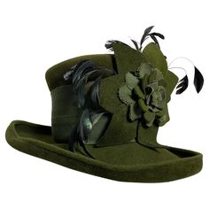 Maison Michel Autumn/Winter Medium Turned-Up Brim Olive Green Felt Beautifully Blocked High Top Hat with Matching Flower, Feathers and Wide Grosgrain Band: Unlabeled, with attached combs for securing. Size 7 Medium. Made in France. Please visit our 1stDibs Store for many more options from the same collection. Green Hat, Green Hats, Wide Brimmed Hats, Steampunk Fashion, Top Hat, Wide Brimmed, Hat Fashion, High Top, Olive Green