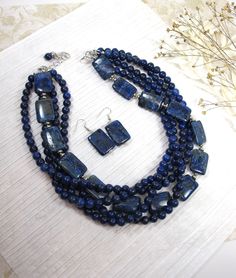 "Natural blue lapis lazuli necklace, genuine blue gemstone necklace, chunky blue natural lapis lazuli  gemstone  necklace, royal blue statement jewelry, blue gemstone  necklace This statement chunky necklace is made from  natural, blue lapis lazuli beads. VERY HEAVY 18\" plus 4\" extender. round beads 8 mm (4 strands), rectangular beads 25mm x 18mm (1 strand) It will perfectly match to your orange, white, green, dark blue or yellow summer outfit.  All my items are handmade with a lot of love, en Yellow Summer Outfit, Blue Gemstone Necklace, Lapis Lazuli Blue, Lapis Lazuli Necklace, Lapis Lazuli Beads, Lapis Lazuli Gemstone, Blue Lapis Lazuli, Necklace Chunky, Jewelry Blue