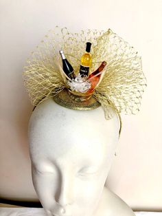 "Wine Fascinator- wine cork - wine headpiece- I love wine -Kentucky derby- Derby days- wine headpiece- Mad hatter headpiece - food -foodie Hello, This fascinator headband has three wine corks and a bird cage net puff ...It's perfect for a wine lover and makes a great conversion piece. It's placed in a 1/8\" satin covered headband that's adjustable and very comfortable. --------------------------------------------------- To return to my shop: https://www.etsy.com/shop/doramarra?ref=si_shop ------ Summer Party Novelty Costume Hats, Novelty Summer Party Costume Hats And Headpieces, Novelty Costume Hats And Headpieces For Summer Party, Novelty Summer Party Hats, Fun Summer Party Mini Hats, Adjustable Novelty Costume Hats For Parties, Adjustable Novelty Costume Hats And Headpieces For Party, Fun Adjustable Mini Hats For Party, Novelty Adjustable Mini Hats For Party