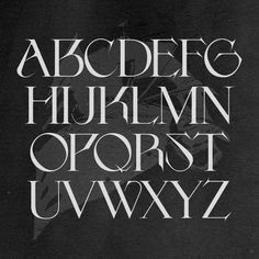 a black and white typeface with the letters in it