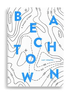 a blue and white book with the words beach town on it