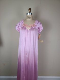 New with original tags from 80s Lilac, pink purple color Made in USA Chest 44 CB 54 Purple Spring Nightgown For Pajama Party, Spring Purple Nightgown For Pajama Party, Purple Nightgown For Pajama Party In Spring, Purple Spring Sleepwear For Home, Spring Purple Home Sleepwear, Purple Summer Nightgown For Pajama Party, Spring Purple Nightgown For Bedtime, Purple Short Sleeve Nightgown For Bedtime, Purple Short Sleeve Nightgown For Sleepover